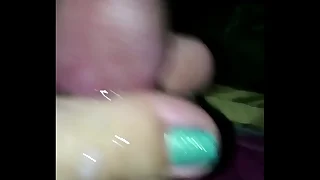 Wife gives closeup footjob cumshot